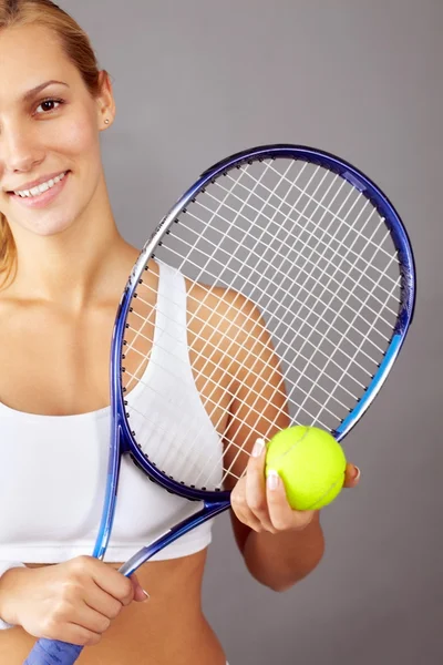 Young girl with tennis racket — Stock Photo, Image