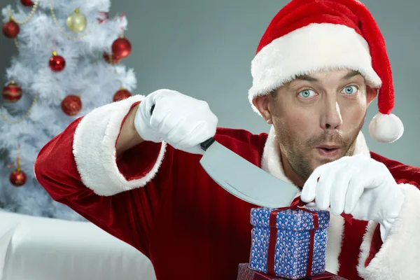 Santa Claus Christmas geschenkdozen snijden — Stockfoto