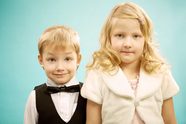 Brother with sister looking at camera — Stock fotografie