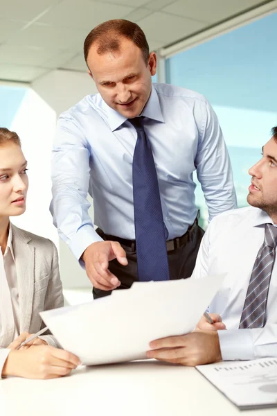 Businesspeople working with documents in office — Stock Photo, Image