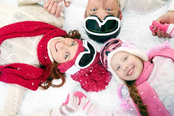 Happy family enjoying in the winter vacation — ストック写真