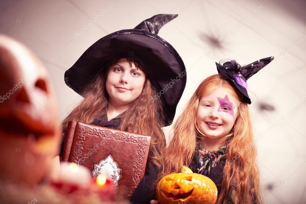 Cute witches with book and Jack O Lantern