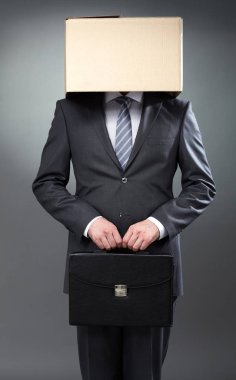 Businessman with box on his head  clipart