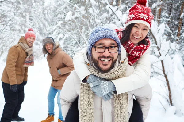 Playful couple having fun in forest — Stock Photo, Image