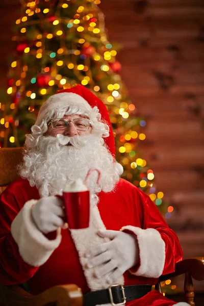 Anta Claus sitting in chair — Stock Photo, Image
