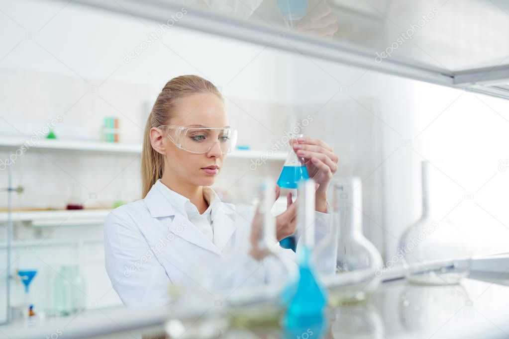 woman testing new substance in lab