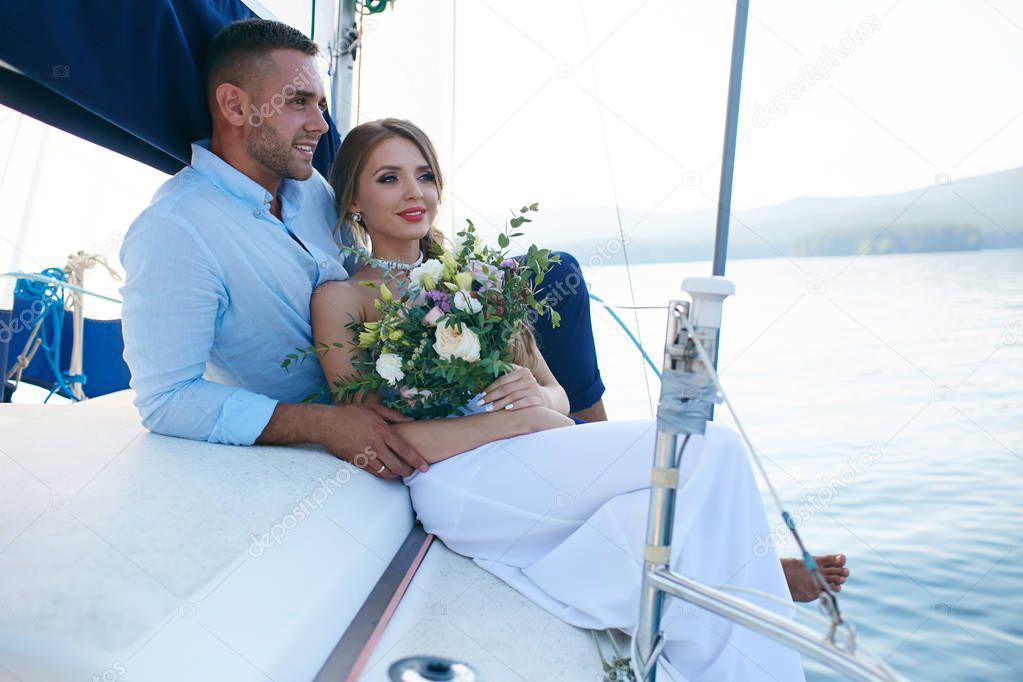 Just married couple traveling by sea