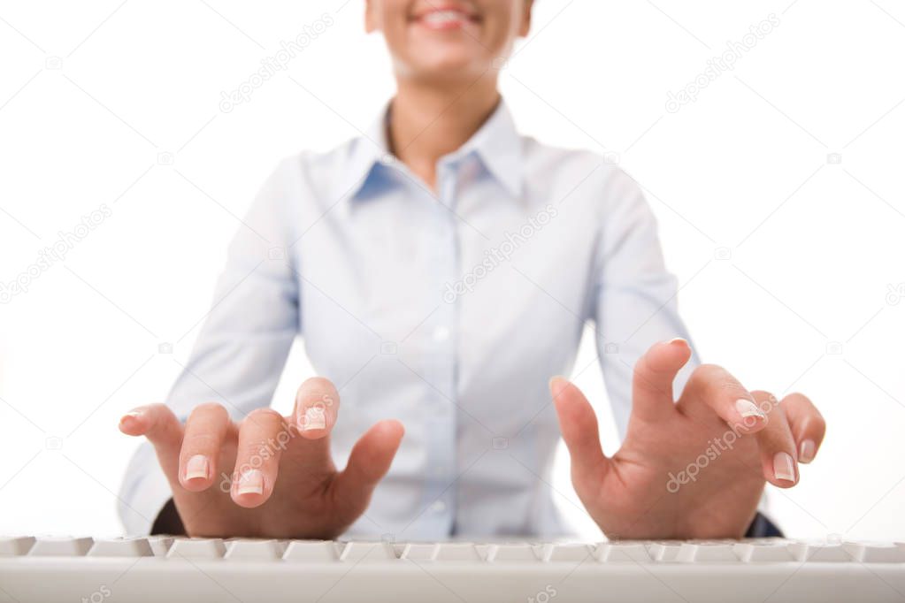 secretary typing on keyboard 
