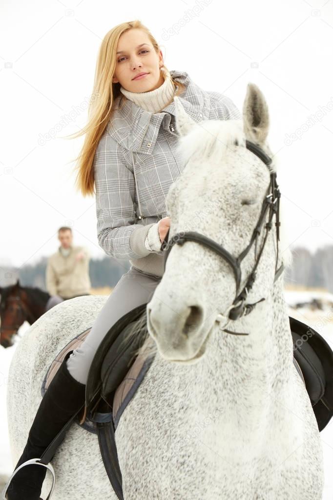 woman going on a horseback