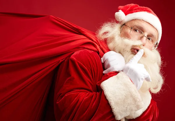 Papai Noel mostrando gesto de silêncio — Fotografia de Stock
