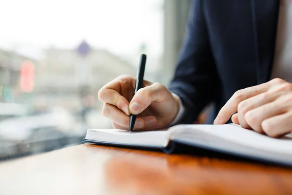 White collar worker writing business plan — Stock Photo, Image