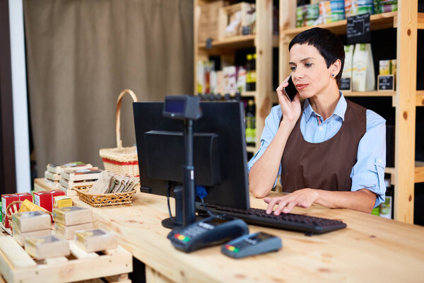 Self-employed woman working in supermarket