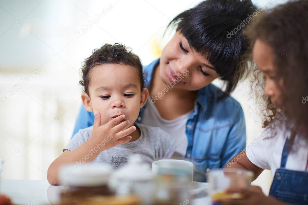 Family eating in kitchen