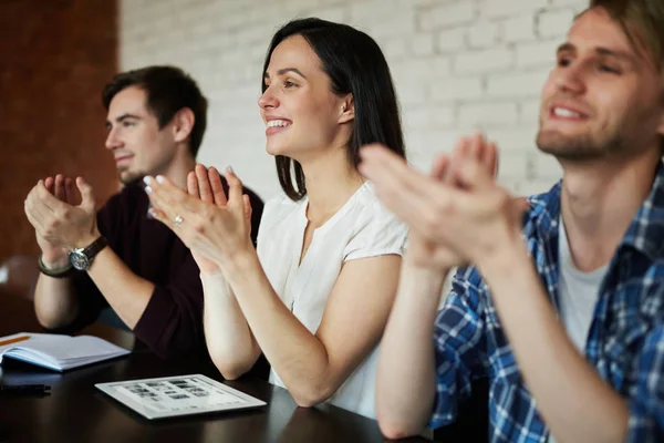Young specialists clapping hands — Stock Photo, Image
