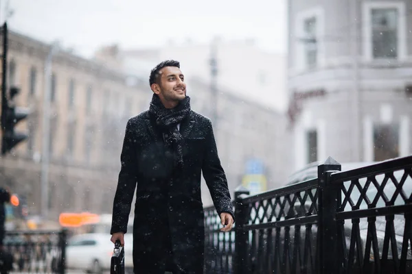 Businessman enjoying winter day — Stock Photo, Image