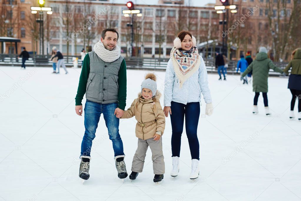 Family on ice-rink