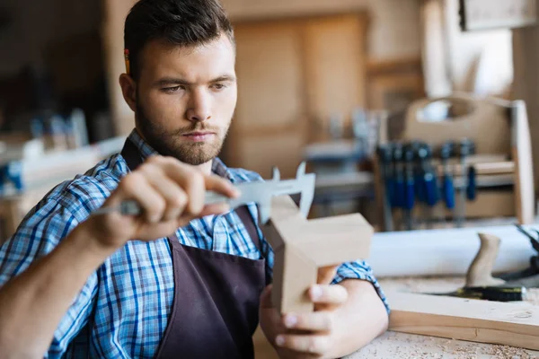 Carpenter using drill-machine — Stock Photo, Image