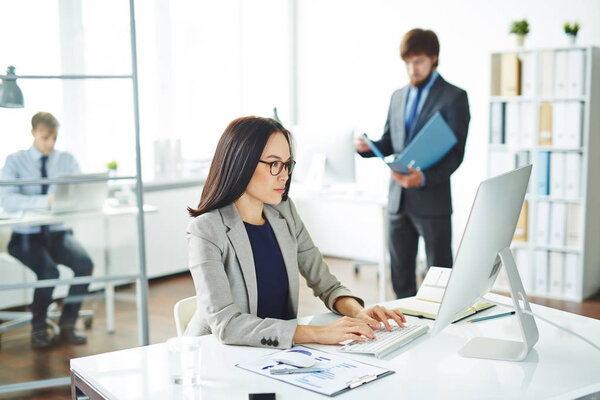  businesswoman looking in monitor