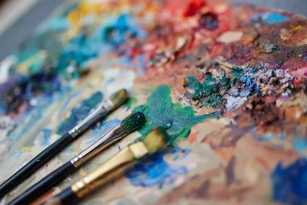 Paints and paint-brushes — Stock Photo, Image