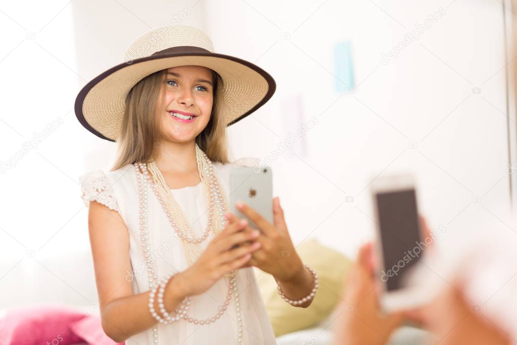 Girl making her selfie 