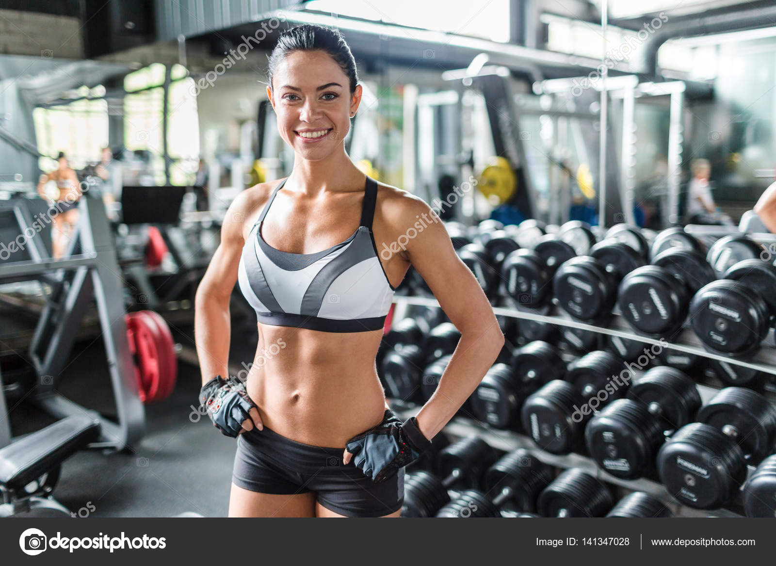 Female fitness instructor Stock Photo by ©pressmaster 141347028