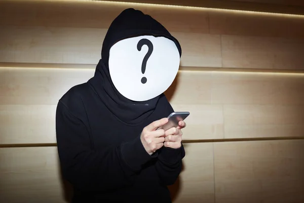 Hacker using smartphone — Stock Photo, Image