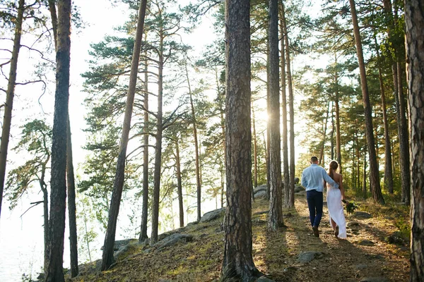 Bride and groom in forest — Stock Photo, Image