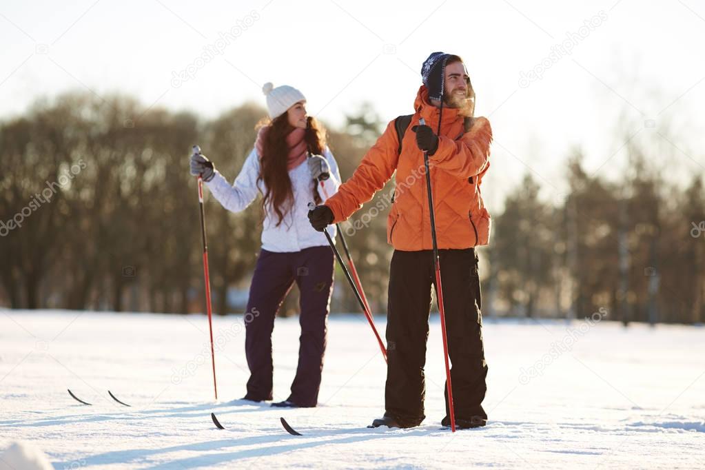couple of young skiers