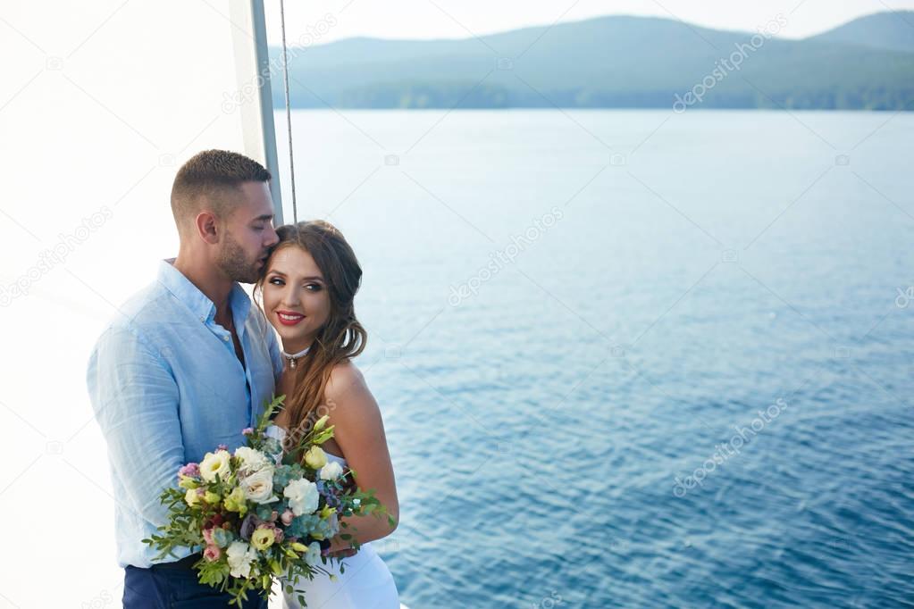 newlyweds traveling on yacht