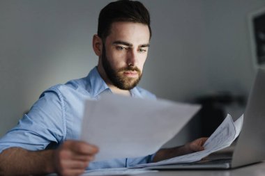 Entrepreneur reading  documents