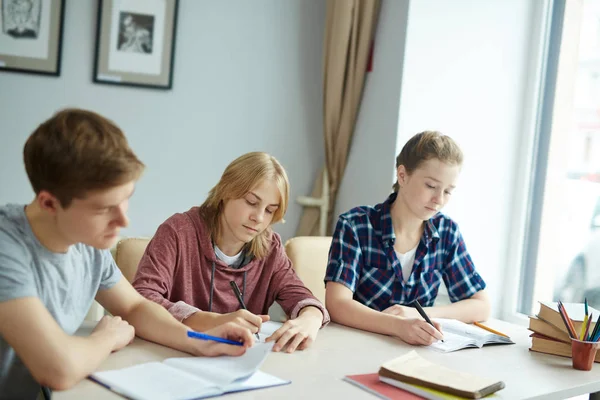 Students writing lecture — Stock Photo, Image