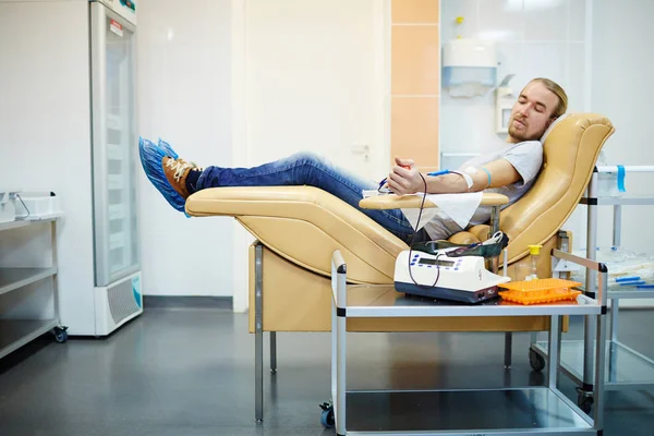 Volunteer donating his blood Royalty Free Stock Images