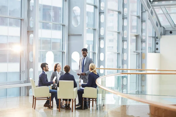 Successful African man sharing his experience — Stock Photo, Image