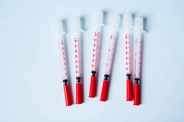 Plastic insulin syringes — Stock Photo, Image