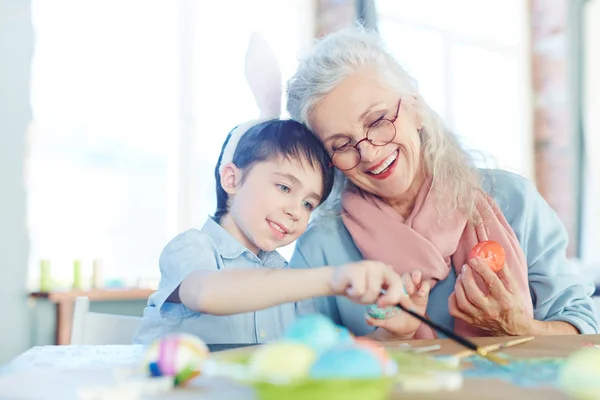 Grandmother and grandson painting — Stock Photo, Image