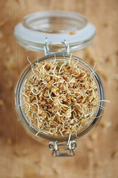 Jar standing on wooden table — Stock Photo, Image