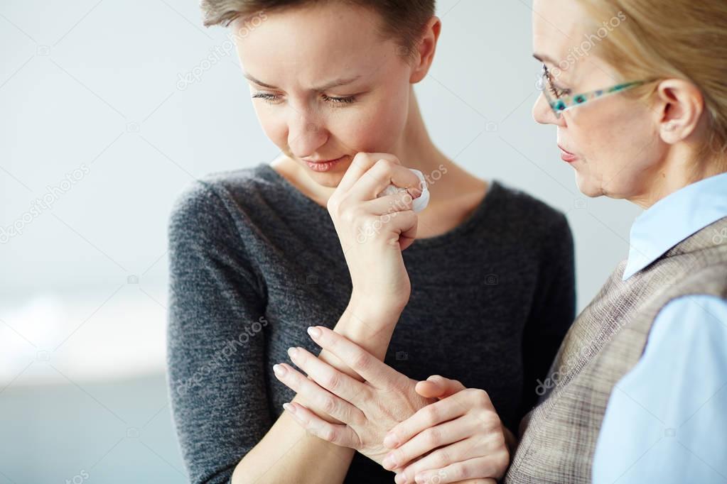 psychologist supporting female