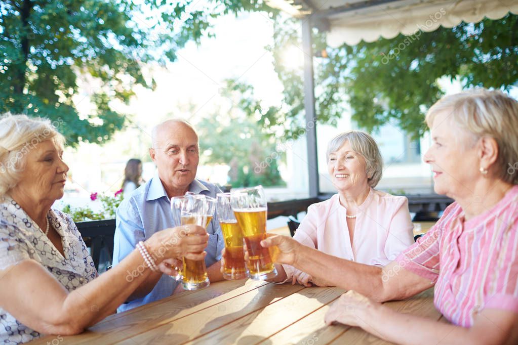 people sitting in outdoor pub