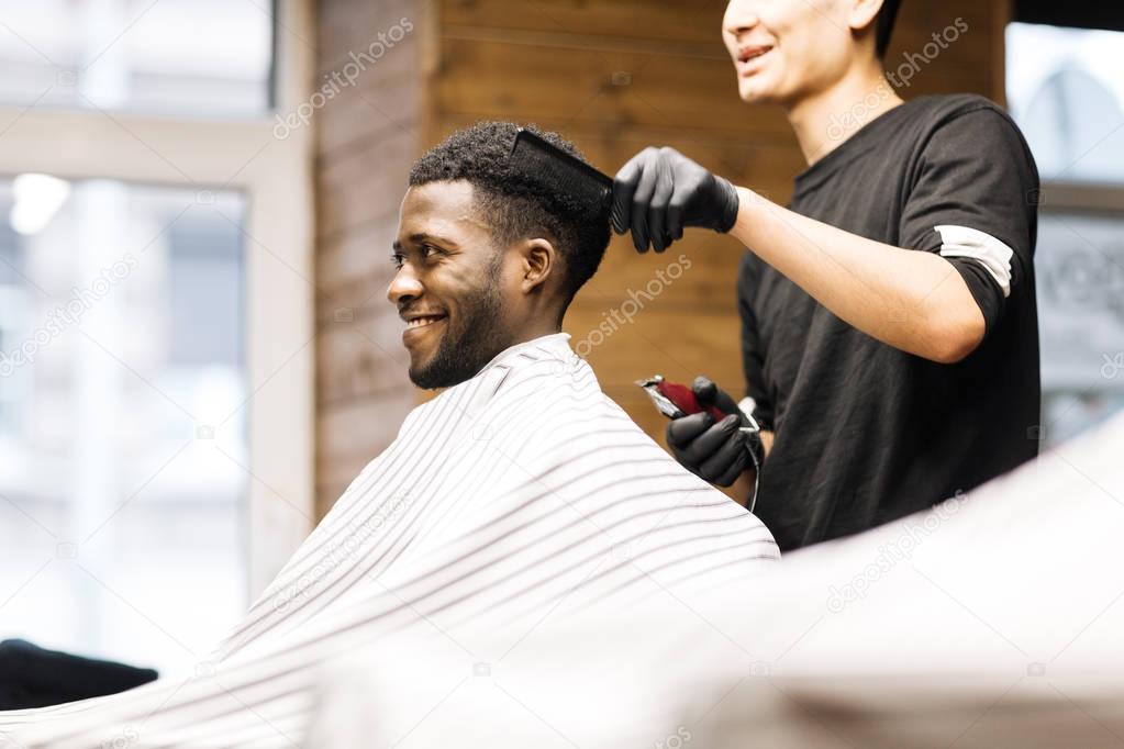 Barber taking care of client 