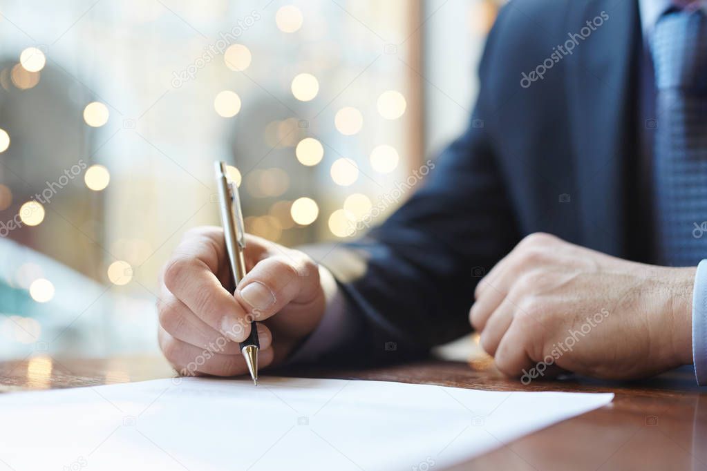Entrepreneur signing business contract 
