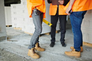 legs of workers wearing jeans clipart
