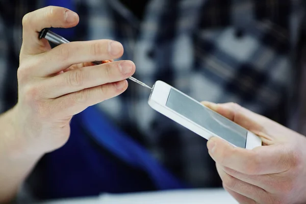 Male hands opening smartphone — Stock Photo, Image