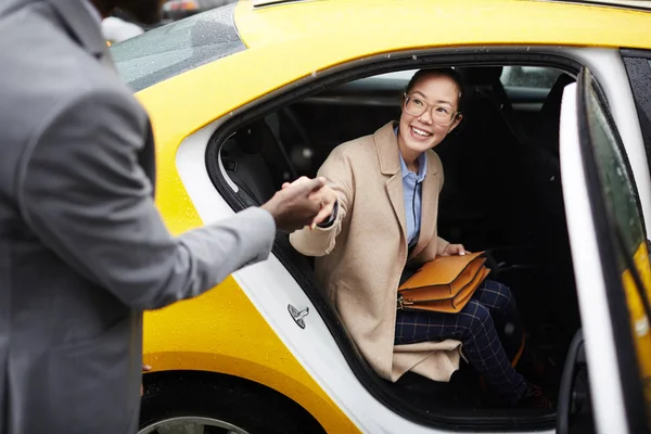 Portrait African American Gentleman Helping Young Smiling Asian Woman Get — Stock Photo, Image