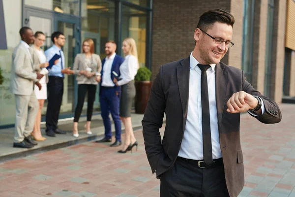 Waist Portrait Smiling Businessman Looking Wristwatch While Standing Office Building — Stock Photo, Image