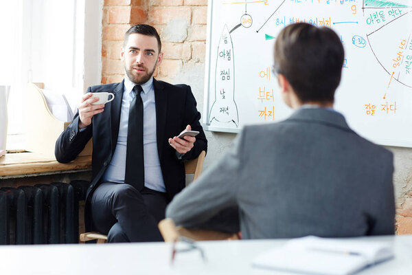 Businessman contemplating about new project in office at break