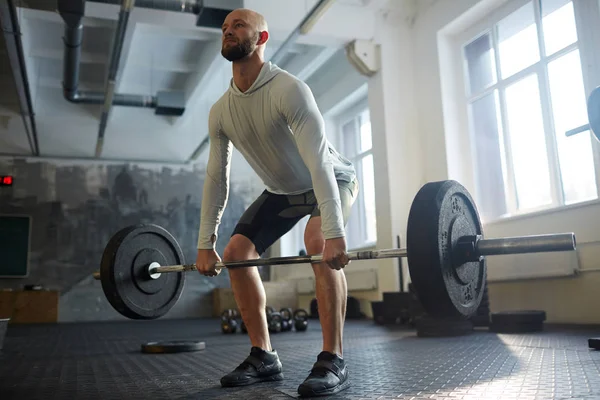 Determined Athlete Lifting Heavy Barbell — Stock Photo, Image