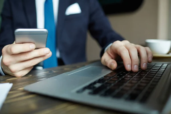 Closeup Portrait Elegant Businessman Working Laptop Holding Smartphone While Browsing — Stock Photo, Image