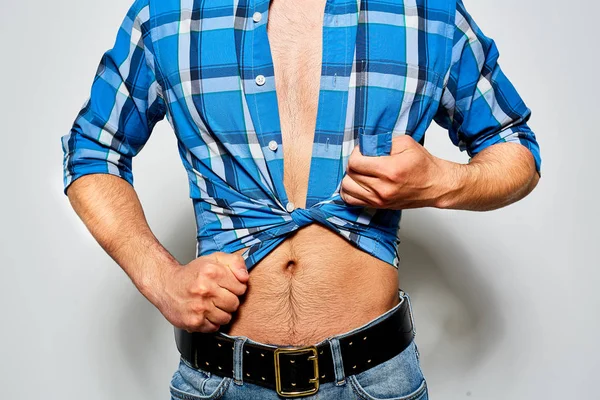 Unrecognizable Young Man Pulling Checked Shirt Demonstrating His Torso While — Stock Photo, Image