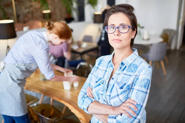 Portrait Confident Restaurant Owner Posing Photography Arms Crossed Busy Red — Stock Photo, Image