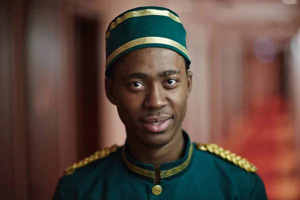 Portrait Smiling Young Bellhop African Ethnicity Working Hotel Welcoming Tourists — Stock Photo, Image